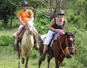 Horseback riders galloping