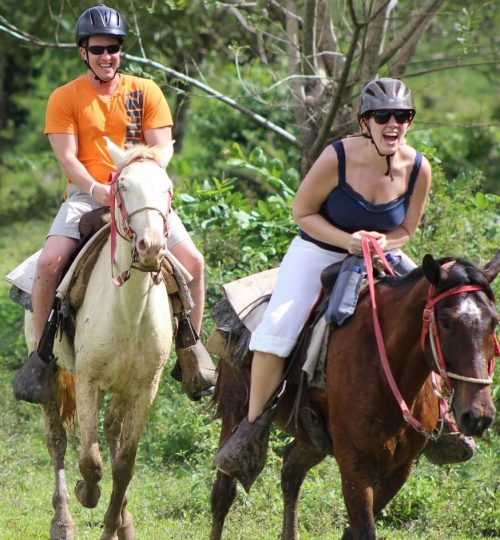 Horseback riders galloping