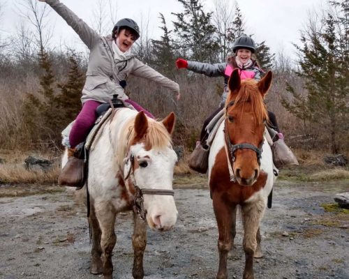 Children having fun on horseback